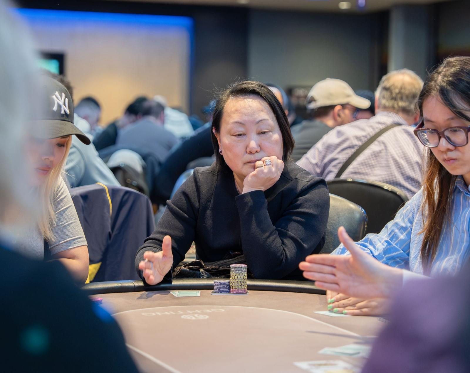 BPS Ladies player with chip stack at Genting Casino Stratford