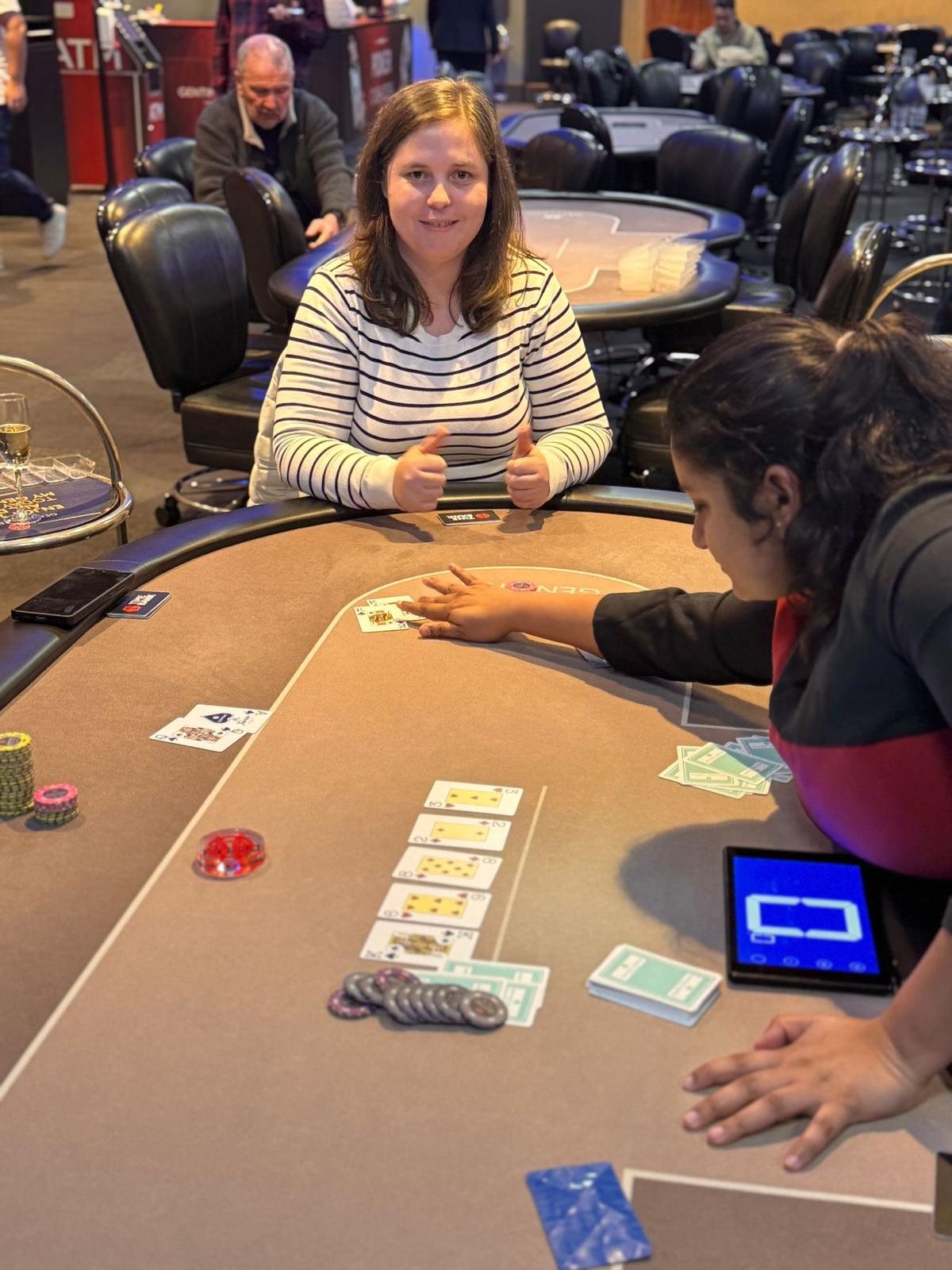 BPS Ladies winner giving thumbs up at the table