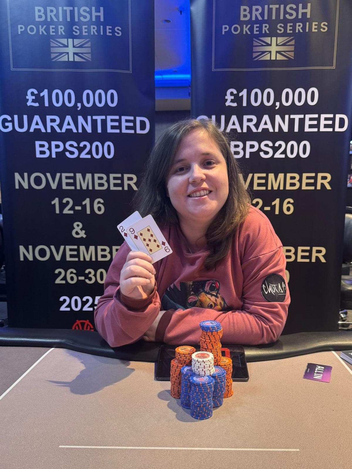 BPS Ladies player with winning hand and chip stack