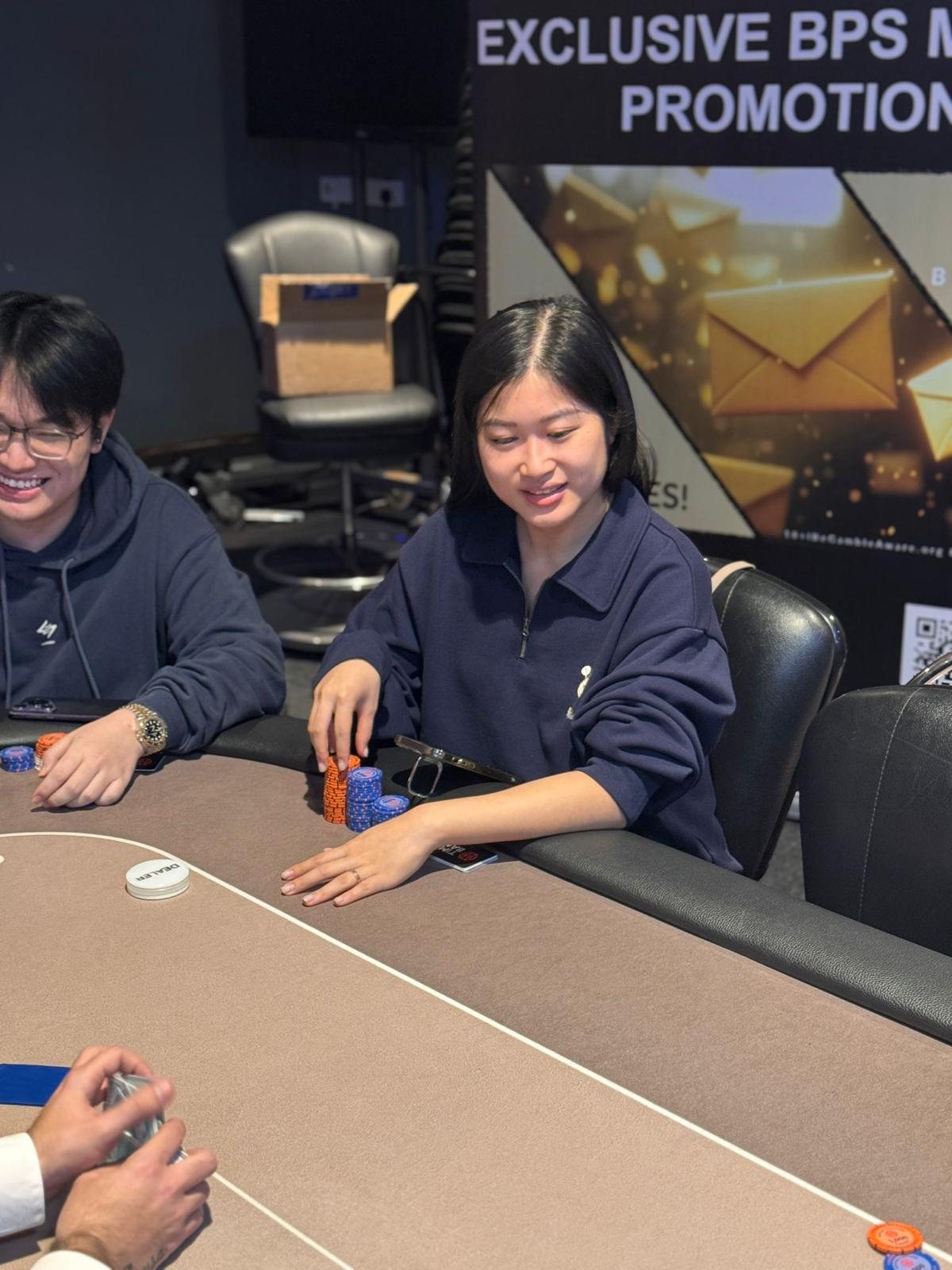 BPS Ladies player stacking chips during play
