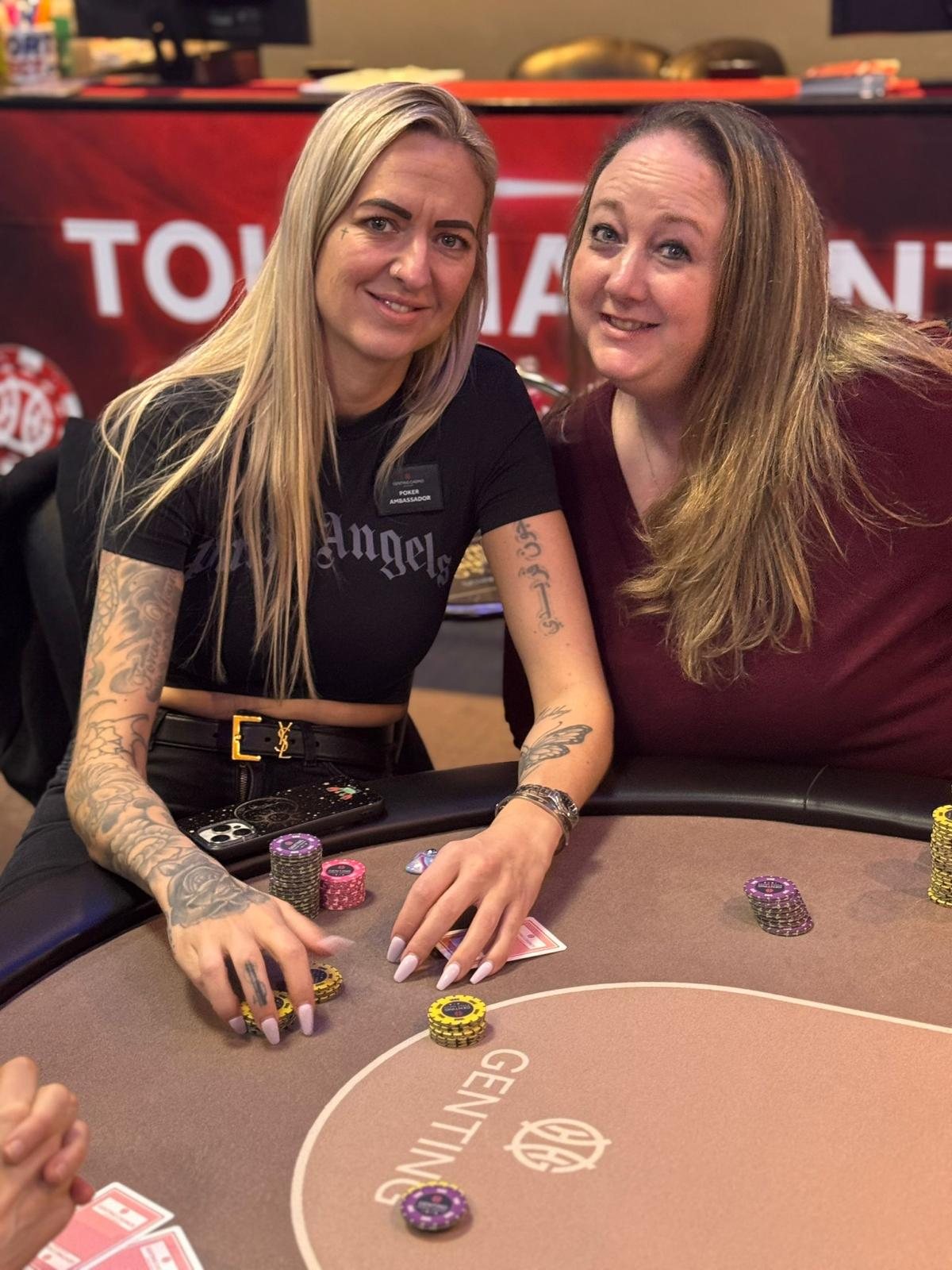 Two BPS Ladies players smiling at the table
