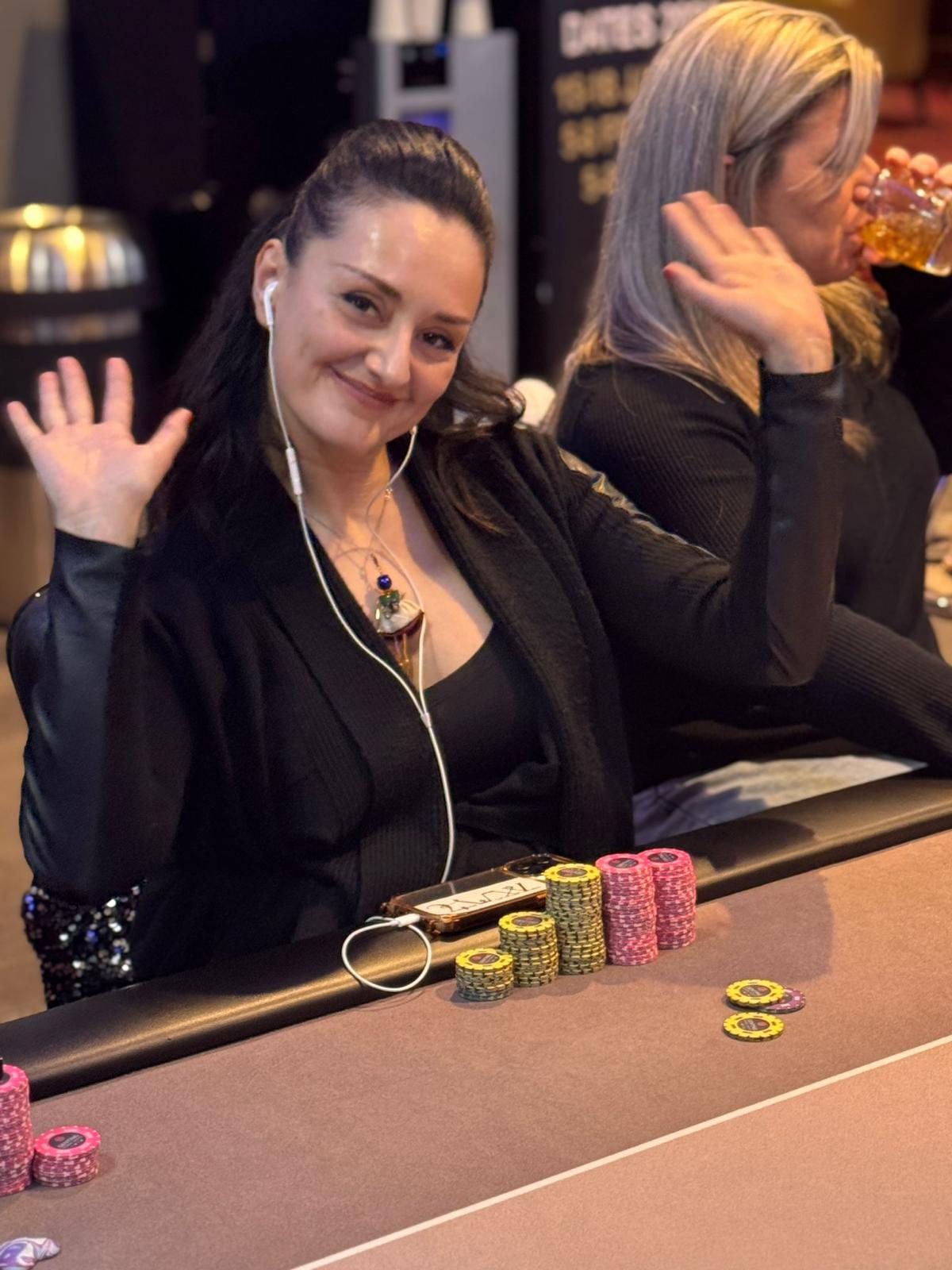BPS Ladies player waving with chip stack