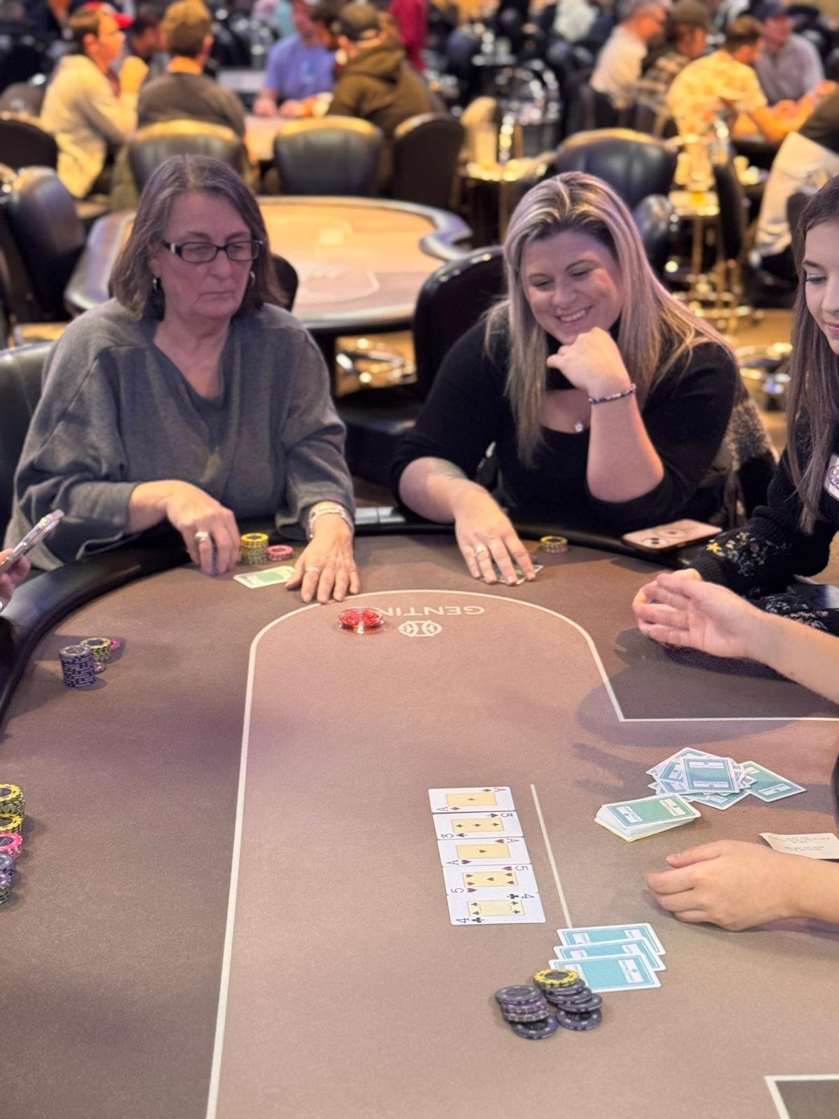 BPS Ladies table with players and board cards